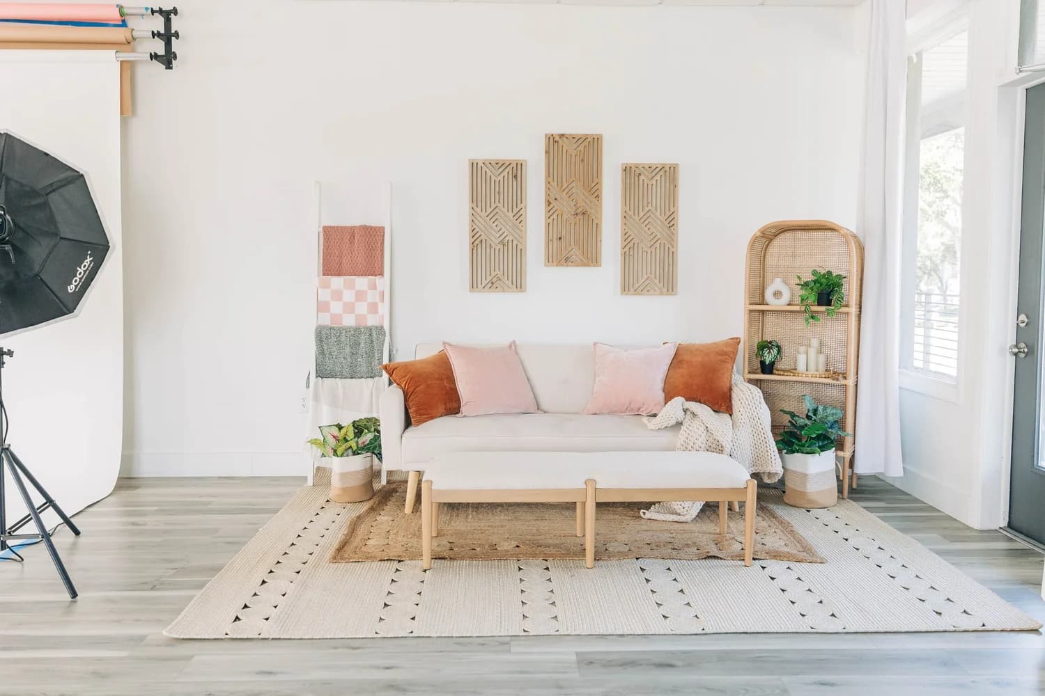 Studio A, a warm, neutral room with a relaxed natural-light setup