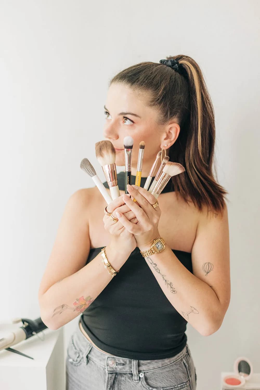 Merissa Anselmi, the studio's on-site hair and makeup artist